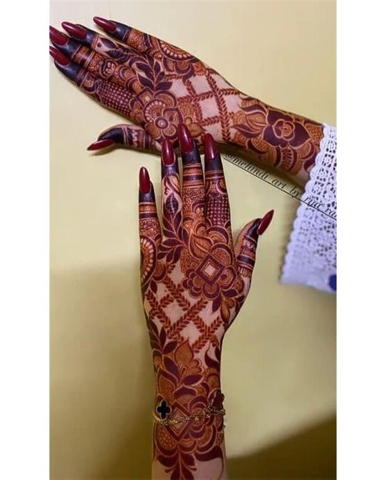 Bead And Plait Modern Back Hand Mehndi Design Idea Bead And Plait Modern Back Hand Mehndi Design Idea